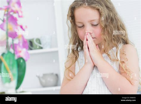 Girl Praying About Something Stock Photo Alamy