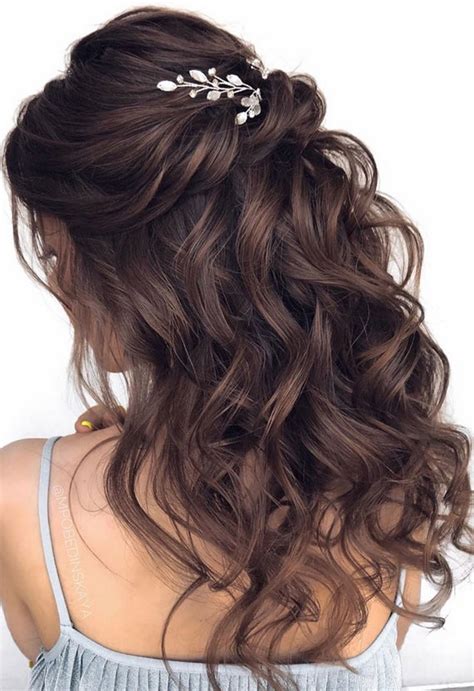 Delicate rosettes up the ante on this classic wedding hairstyle. Half Up Half Down Wedding Hairstyles | Roses & Rings
