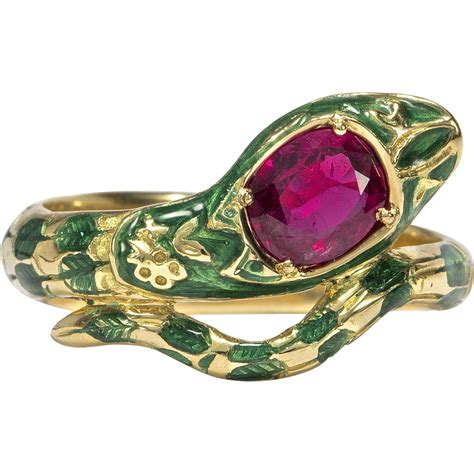 A Vintage 18kt Gold Snake Ring With Large Ruby And Green Enamel Gold