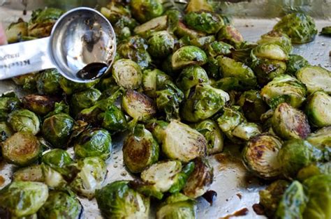 The Brussel Sprouts Are Being Prepared To Be Cooked In The Oven
