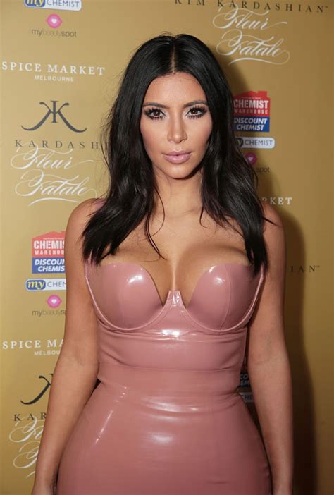 Kim Kardashian Exposes Cleavage As She Squeezes Into Eye Popping Pink