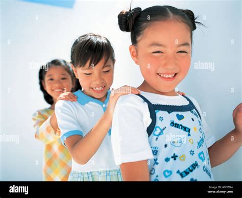 Three Girls Playing Stock Photo Alamy