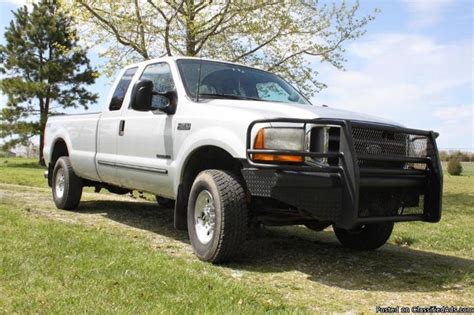 Yes, a shotgun will fit. 2000 Ford F-250 XLT, 7.3 liter diesel, Super Duty, Super cab, 4 wheel drive, Long bed, lots of ...