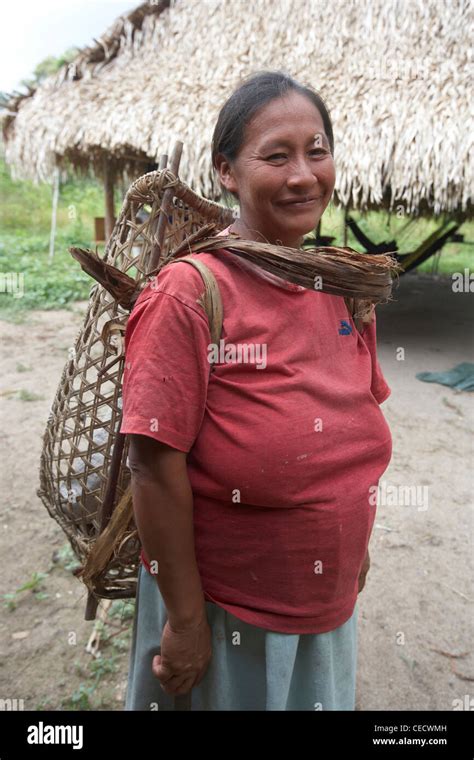 Amerindian Woman With A Traditional Woven Carrying Basket Rewa