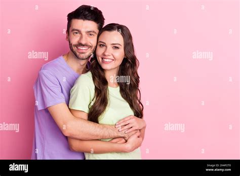 Portrait Of Attractive Sweet Tender Cheerful Couple Embracing