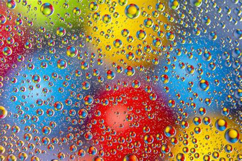 Colored Drops Of Water On Glass Abstract Background Texture Stock