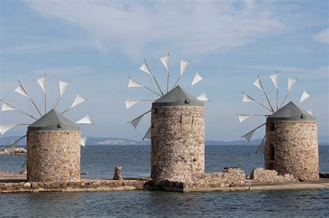 Old Traditional Windmills At Beach Of Chios Town On Chios Island In