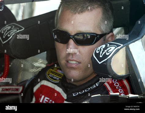 Race Car Driver Jeremy Mayfield Sits In His Race Car Before Nascar