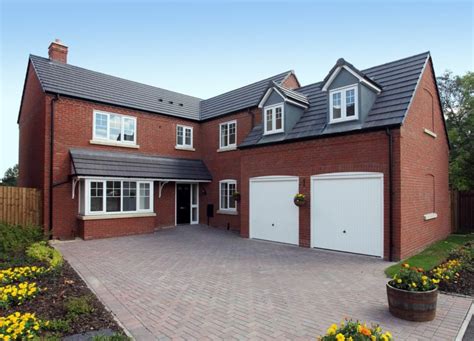 Driveway prices depend on the size. How Much Does a New Driveway Cost? An Informative Guide ...