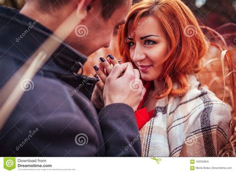 Young Man Warms His Girlfriend`s Hands In Autumn Forest Stock Image Image Of Autumn Lifestyle