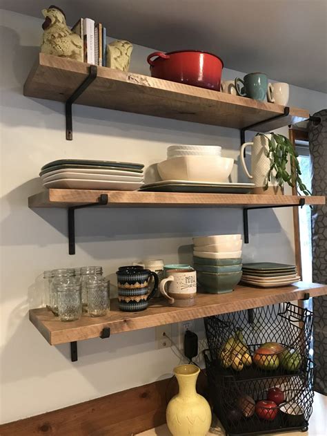 What better place to put the most used kitchen stuff than on kitchen shelves? Rustic Floating Shelves with Metal Hanging Brackets ...