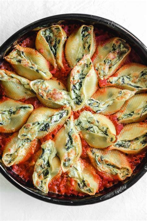 Pasta Shells Stuffed With Spinach And Ricotta In Homemade Tomato Sauce