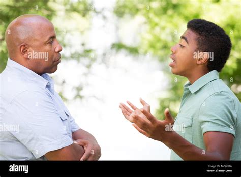 Father And Son Having A Serious Conversation Stock Photo Alamy