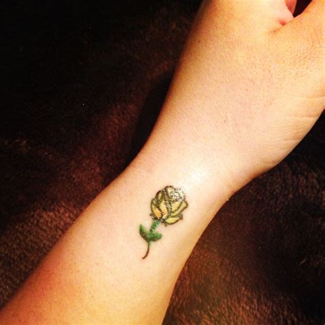 Tattoofilter is a tattoo community, tattoo gallery and international tattoo artist, studio and event. Small yellow rose tattoo | Body Art | Pinterest | Yellow ...