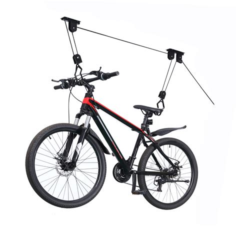 Bicycle hoisted and excess pulley rope attached to wall holder. Robtec Ceiling Bike Hoist - Walmart.com - Walmart.com
