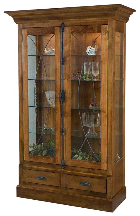 Three small drawers are perfect for the storage of small items while the large storage area on bottom hidden by four pull out doors is more than enough for your larger. Amish Made China Cabinet