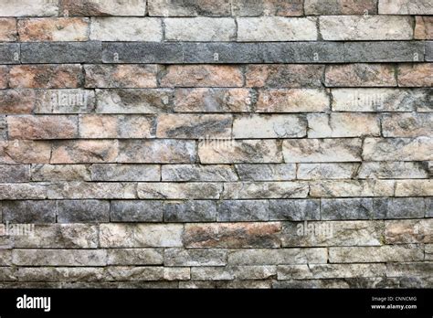 Wall Texture Made From Rough Untreated Marble Bricks Of Different Sizes