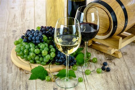 Two Clear Wine Glasses Near White And Red Grapes And Wine Barrel Hd