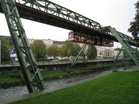 A suspension railway is a form of elevated monorail in which the vehicle is suspended from a fixed track (as opposed to a cable used in aerial tramways), which is built above streets, waterways, or. The Wuppertal Suspension Railway - 2021 All You Need to ...