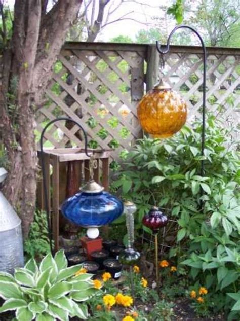 As the seasons and years passed, i found better and and more unusual. lamp base hanging on a garden S-hook..IDEAS - Garden Junk ...