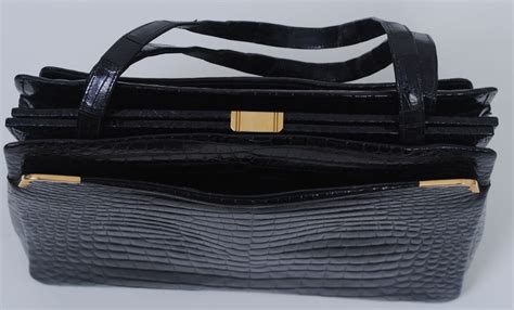 In 1958, when marilyn monroe wanted a vanity case for traveling, morabito created a classic the orsay bag. MORABITO BLACK CROCODILE HANDBAG at 1stdibs