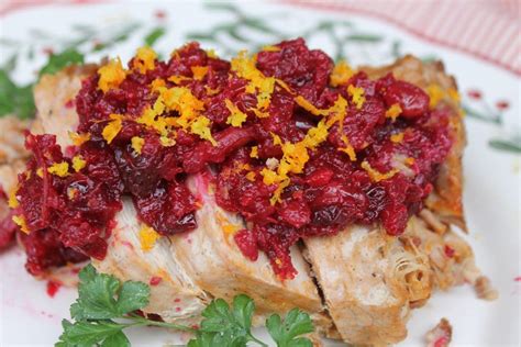 Pour cranberry mixture over pork roast. Slow Cooker Pork Loin With Cranberry Walnut Relish - Thrifty Jinxy