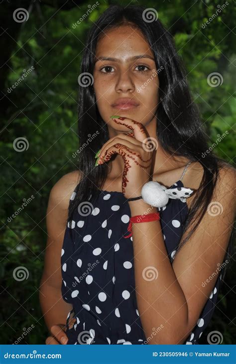 Portrait Of A Beautiful North Indian Young Girl Looking At The Camera