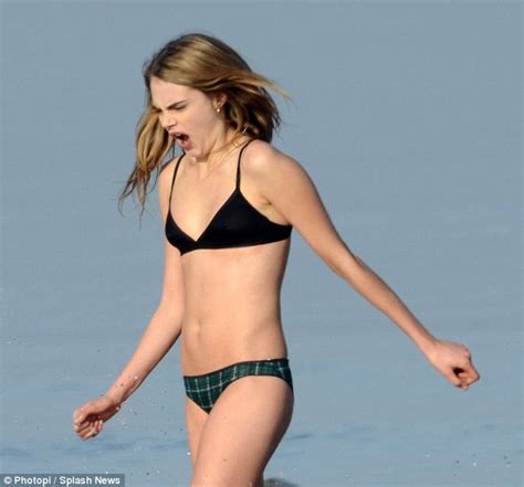 Cara Delevingne Shows Off Her Toned Torso As She Strips Down For Movie