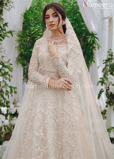 white pakistani bridal dress in lehenga gown bs620