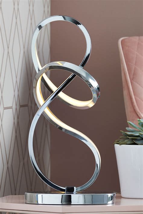 Next LED Sculptural Touch Table Lamp - Chrome | £75.00 | Gay Times