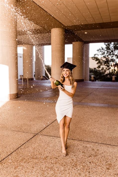 TXST Senior Pictures Champagne Popping Texas State University San Marcos TX Photographer