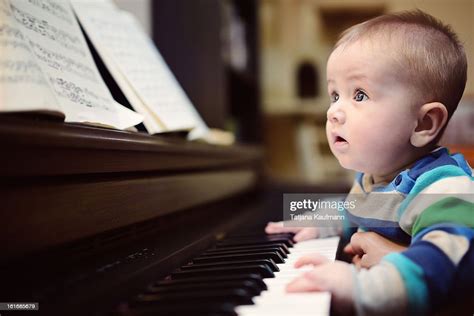 Baby Playing Piano High Res Stock Photo Getty Images