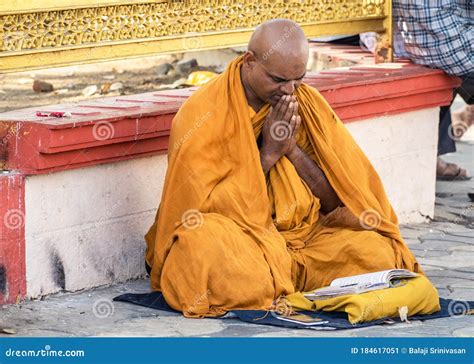 A Buddhist Monk Praying In A Temple Editorial Photo Image Of Folded Lifestyle 184617051