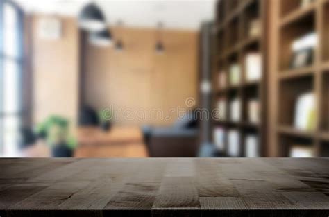 Wooden Board Empty Table Top And Blur Interior Over Blur In Coffee Shop