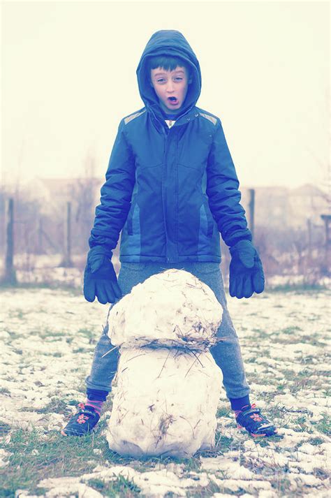 Boy With Snowman Photograph By Tom Gowanlock Fine Art America