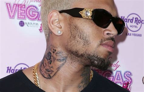 Chris Browns New Tattoo Depicts Battered Rihanna