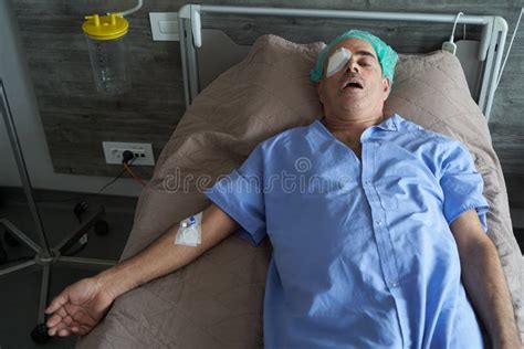 Portrait Of An Elderly Man In Hospital Bed Close Up Stock Image