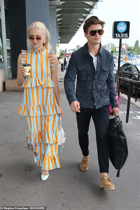 Pixie Lott And Fiancé Oliver Cheshire Arrive At Nice Airport For Cannes
