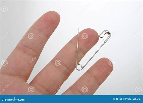 Safety Pin Stuck In Finger Stock Photo Image 46150