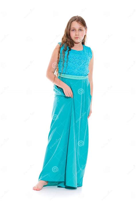 Girl 10 11 Years Old In A Long Emerald Dress With Bare Feet Stock