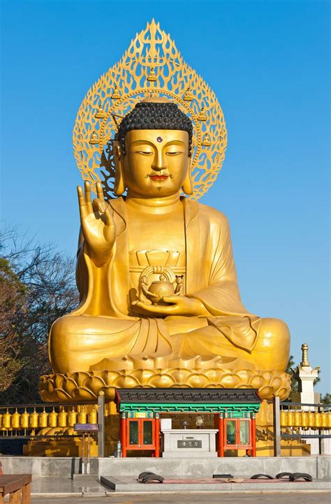 Golden Buddha Statue At Buddhist Temple Of Sanbanggulsa At Sanbangsan