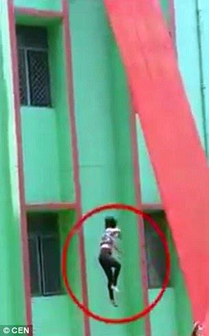 Horrific Moment Teacher Crashes FT To Concrete Floor When She Falls Off Slide During Mock