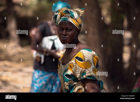 A Mandinka Mandingo Woman In Traditional Dress Performs Traditional