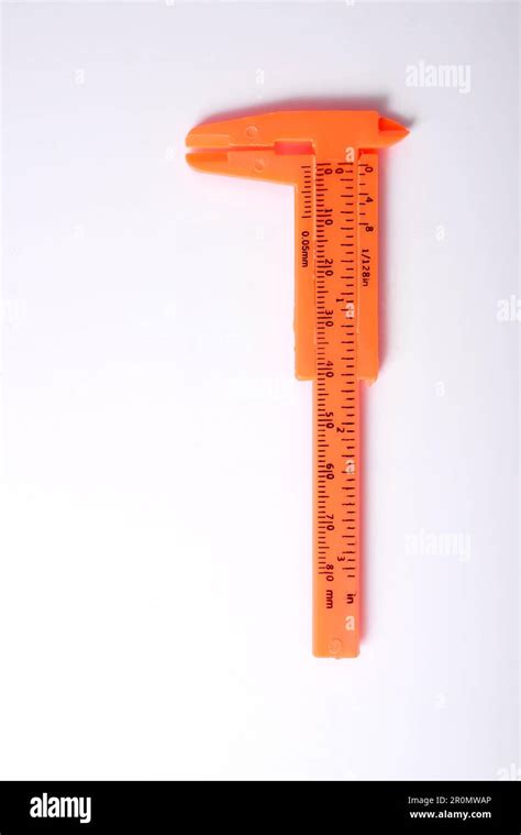 El Calibre De Nonio De Plástico Naranja El Nonio Es Un Instrumento De