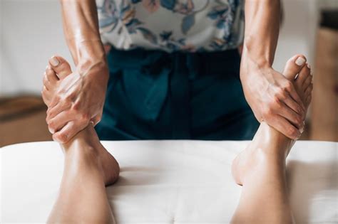 Premium Photo Ayurvedic Reflexology Foot Massage With Essential Oil