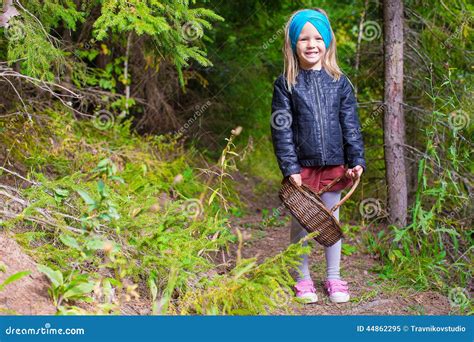 little happy girl pick up mushrooms in autumn stock image image of adorable meadow 44862295