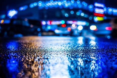 Rainy Night In The Big City Dense Traffic At A Busy Intersection In
