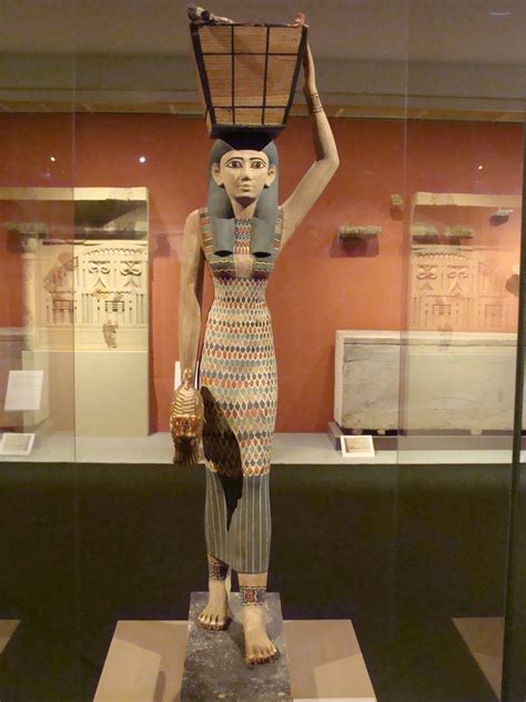 Egyptian Woman With A Sheath Dress Wide Faience Collar And A Basket