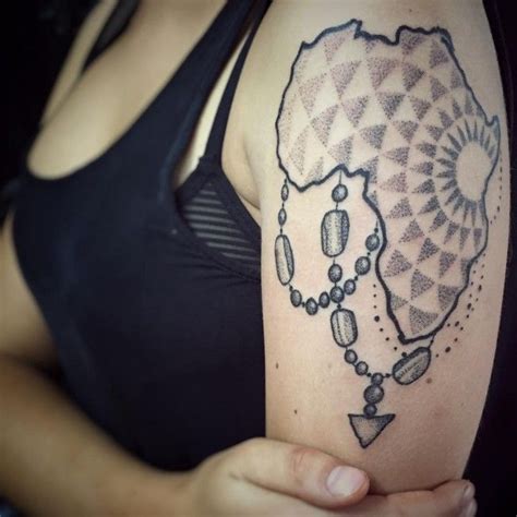 Black N Grey Ink Perfect Africa Map Tattoo On Girl Shoulder Symbol