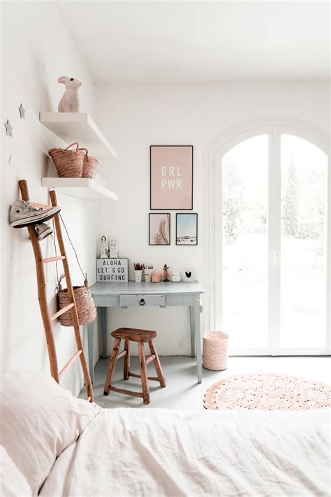This farmhouse master bedroom pulls it off by pairing a sliding barn door and weathered bench with sleeker furnishings, like a midcentury modern pendant light. Boho Surfer Bedroom Makeover For Teen Girl — decor8